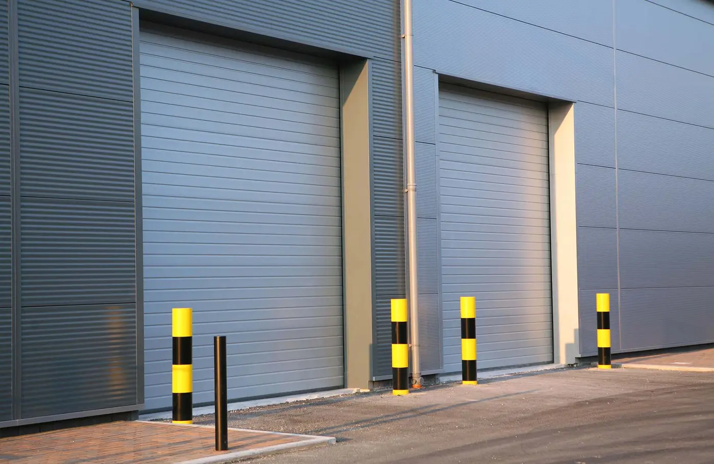 Detail of steel roller-shutter doors on a new industrial unit